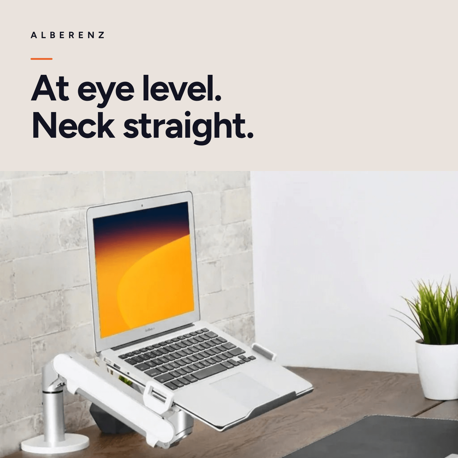 Alberenz gas spring laptop arm, silver: screen at eye level on a wooden desk