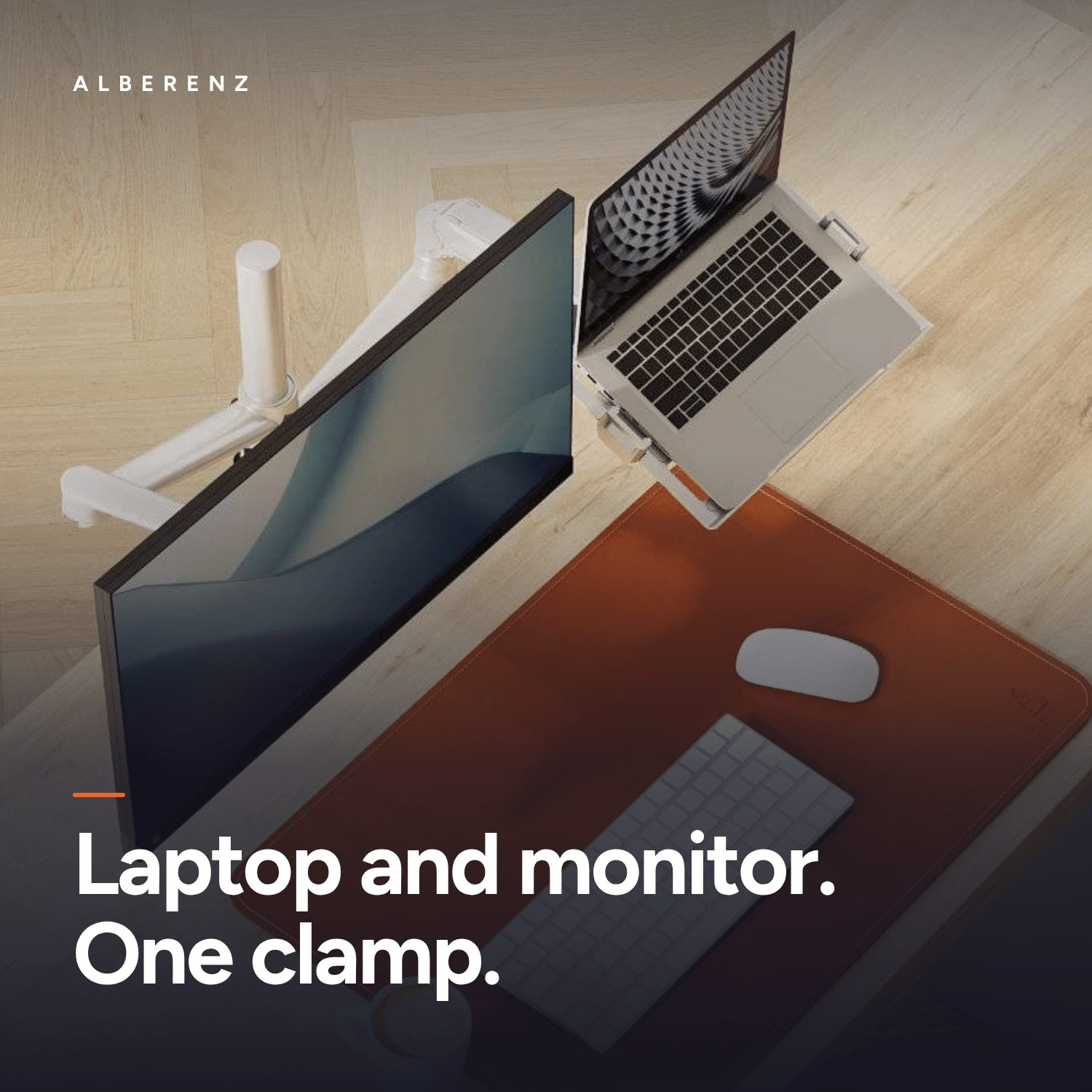 Monitor arm with laptop tray Alberenz on a desk: laptop and monitor on one clamp