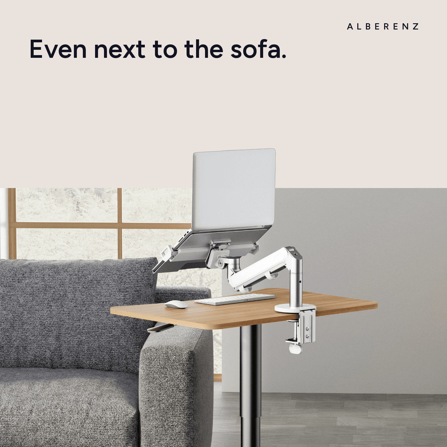 Alberenz gas spring laptop arm, silver: next to the sofa, clamped to a side table
