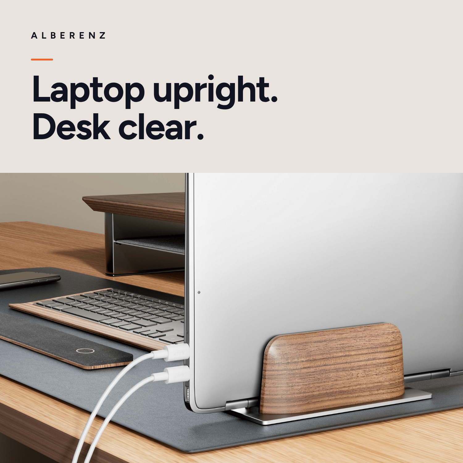 Alberenz vertical laptop stand in walnut: laptop upright on the desk, desk clear