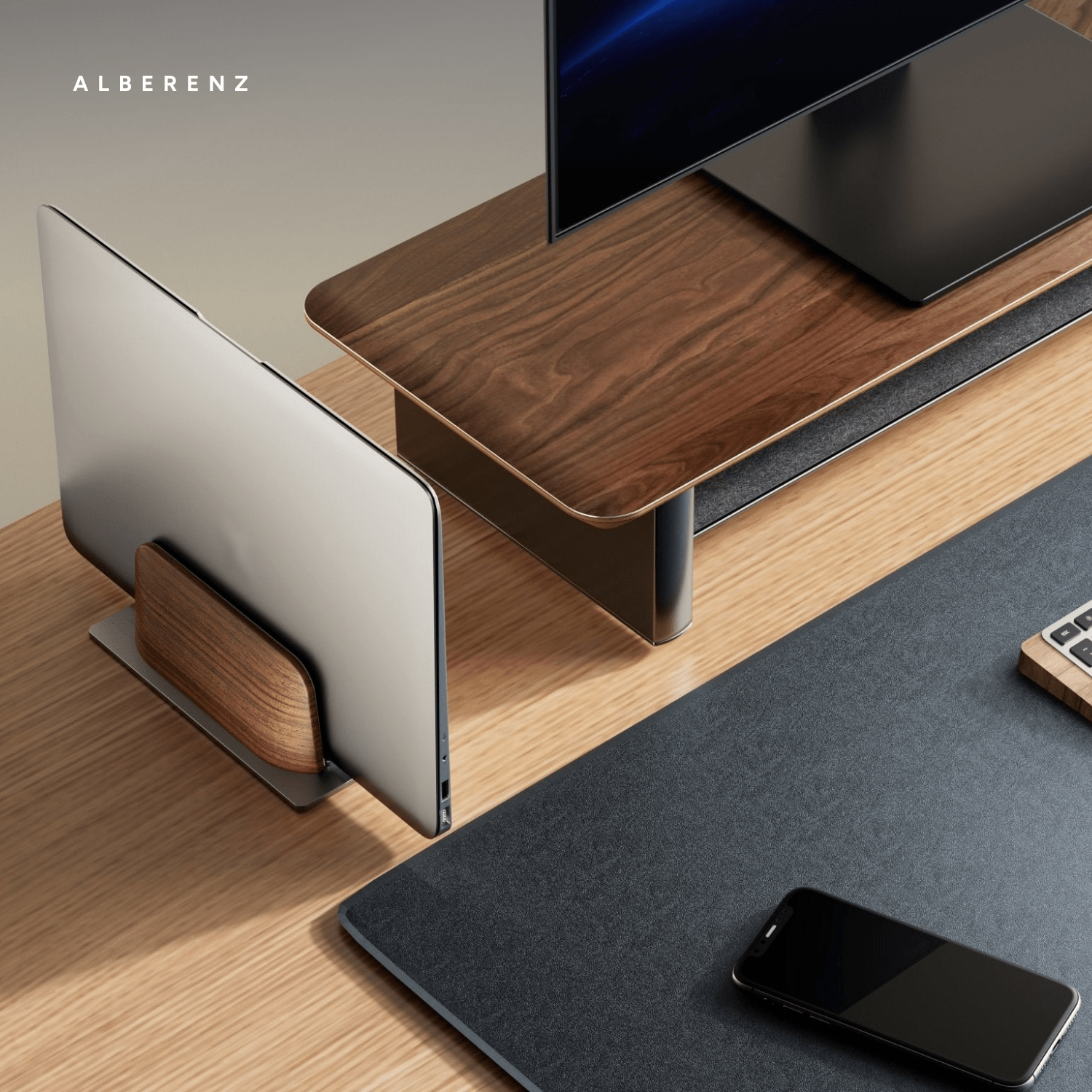Alberenz vertical laptop stand in walnut: lifestyle photo from above next to a monitor riser